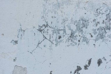 Doku, duvar, beton, arka plan olarak kullanılabilir. Çizik ve çatlaklarla dolu bir duvar parçası.