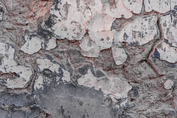 Doku, duvar, beton, arka plan olarak kullanılabilir. Çizik ve çatlaklarla dolu bir duvar parçası.