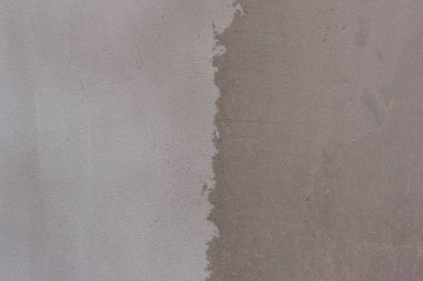 Doku, duvar, beton, arka plan olarak kullanılabilir. Çizik ve çatlaklarla dolu bir duvar parçası.