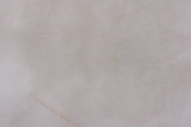 Doku, duvar, beton, arka plan olarak kullanılabilir. Çizik ve çatlaklarla dolu bir duvar parçası.