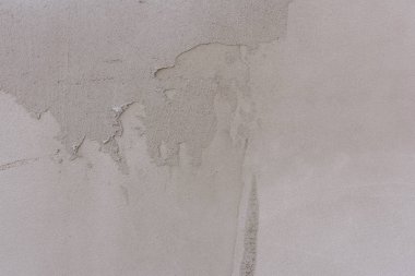 Doku, duvar, beton, arka plan olarak kullanılabilir. Çizik ve çatlaklarla dolu bir duvar parçası.