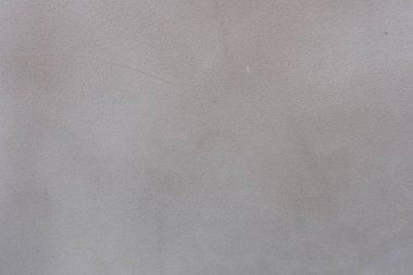 Doku, duvar, beton, arka plan olarak kullanılabilir. Çizik ve çatlaklarla dolu bir duvar parçası.