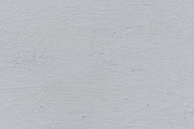 Doku, duvar, beton, arka plan olarak kullanılabilir. Çizik ve çatlaklarla dolu bir duvar parçası.