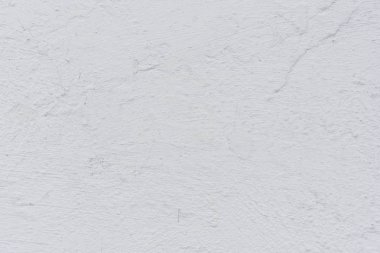 Doku, duvar, beton, arka plan olarak kullanılabilir. Çizik ve çatlaklarla dolu bir duvar parçası.