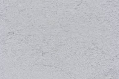 Doku, duvar, beton, arka plan olarak kullanılabilir. Çizik ve çatlaklarla dolu bir duvar parçası.