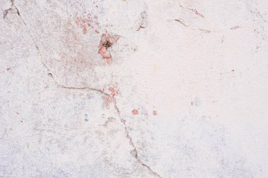 Doku, duvar, beton, arka plan olarak kullanılabilir. Çizik ve çatlaklarla dolu bir duvar parçası.