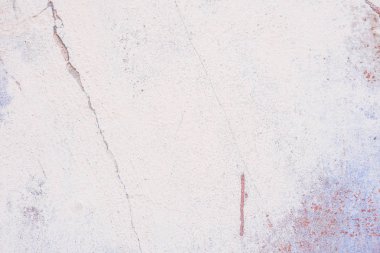 Doku, duvar, beton, arka plan olarak kullanılabilir. Çizik ve çatlaklarla dolu bir duvar parçası.