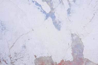 Doku, duvar, beton, arka plan olarak kullanılabilir. Çizik ve çatlaklarla dolu bir duvar parçası.