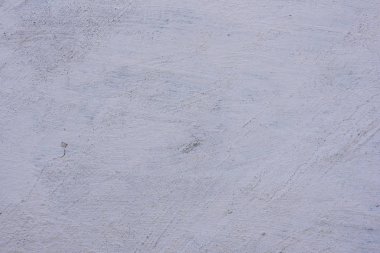 Doku, duvar, beton, arka plan olarak kullanılabilir. Çizik ve çatlaklarla dolu bir duvar parçası.