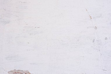 Doku, duvar, beton, arka plan olarak kullanılabilir. Çizik ve çatlaklarla dolu bir duvar parçası.