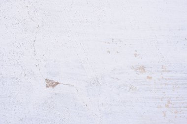 Doku, duvar, beton, arka plan olarak kullanılabilir. Çizik ve çatlaklarla dolu bir duvar parçası.