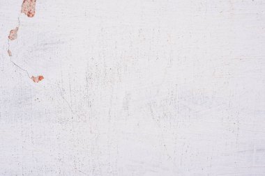 Doku, duvar, beton, arka plan olarak kullanılabilir. Çizik ve çatlaklarla dolu bir duvar parçası.