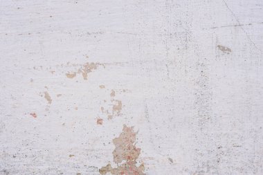 Doku, duvar, beton, arka plan olarak kullanılabilir. Çizik ve çatlaklarla dolu bir duvar parçası.