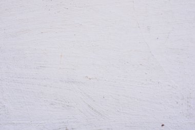 Doku, duvar, beton, arka plan olarak kullanılabilir. Çizik ve çatlaklarla dolu bir duvar parçası.