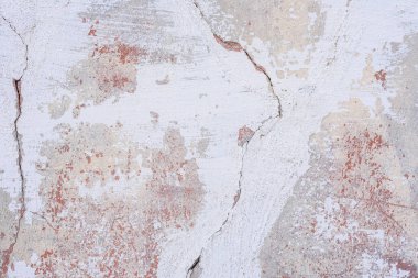 Doku, duvar, beton, arka plan olarak kullanılabilir. Çizik ve çatlaklarla dolu bir duvar parçası.