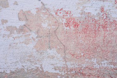 Doku, duvar, beton, arka plan olarak kullanılabilir. Çizik ve çatlaklarla dolu bir duvar parçası.