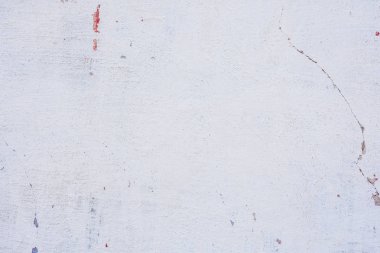 Doku, duvar, beton, arka plan olarak kullanılabilir. Çizik ve çatlaklarla dolu bir duvar parçası.