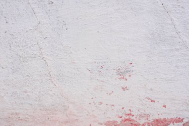 Doku, duvar, beton, arka plan olarak kullanılabilir. Çizik ve çatlaklarla dolu bir duvar parçası.