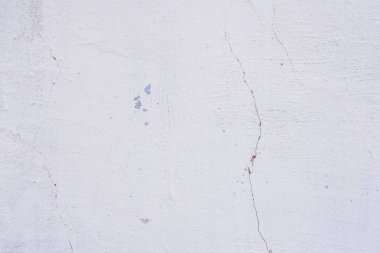 Doku, duvar, beton, arka plan olarak kullanılabilir. Çizik ve çatlaklarla dolu bir duvar parçası.