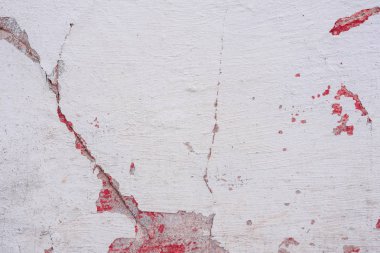 Doku, duvar, beton, arka plan olarak kullanılabilir. Çizik ve çatlaklarla dolu bir duvar parçası.