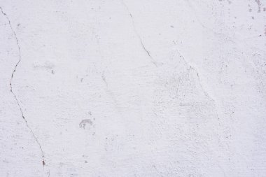 Doku, duvar, beton, arka plan olarak kullanılabilir. Çizik ve çatlaklarla dolu bir duvar parçası.