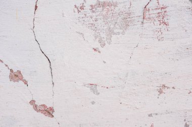 Doku, duvar, beton, arka plan olarak kullanılabilir. Çizik ve çatlaklarla dolu bir duvar parçası.