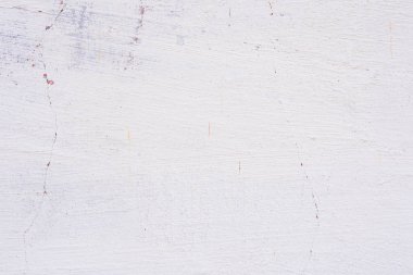 Doku, duvar, beton, arka plan olarak kullanılabilir. Çizik ve çatlaklarla dolu bir duvar parçası.