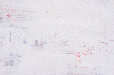 Doku, duvar, beton, arka plan olarak kullanılabilir. Çizik ve çatlaklarla dolu bir duvar parçası.