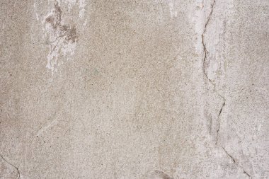 Doku, duvar, beton, arka plan olarak kullanılabilir. Çizik ve çatlaklarla dolu bir duvar parçası.