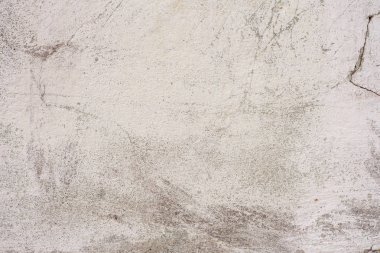 Doku, duvar, beton, arka plan olarak kullanılabilir. Çizik ve çatlaklarla dolu bir duvar parçası.