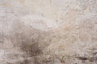 Doku, duvar, beton, arka plan olarak kullanılabilir. Çizik ve çatlaklarla dolu bir duvar parçası.