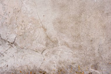 Doku, duvar, beton, arka plan olarak kullanılabilir. Çizik ve çatlaklarla dolu bir duvar parçası.