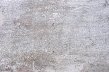 Doku, duvar, beton, arka plan olarak kullanılabilir. Çizik ve çatlaklarla dolu bir duvar parçası.