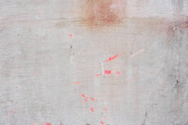 Doku, duvar, beton, arka plan olarak kullanılabilir. Çizik ve çatlaklarla dolu bir duvar parçası.