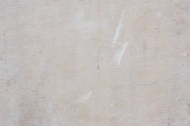 Doku, duvar, beton, arka plan olarak kullanılabilir. Çizik ve çatlaklarla dolu bir duvar parçası.