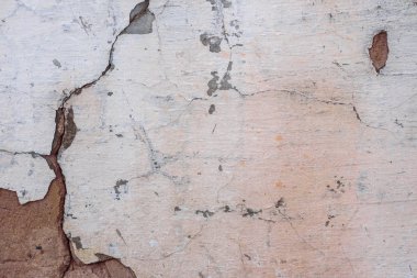 Doku, duvar, beton, arka plan olarak kullanılabilir. Çizik ve çatlaklarla dolu bir duvar parçası.