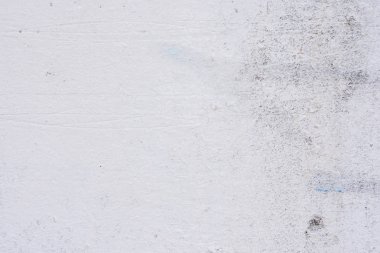 Doku, duvar, beton, arka plan olarak kullanılabilir. Çizik ve çatlaklarla dolu bir duvar parçası.