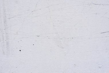 Doku, duvar, beton, arka plan olarak kullanılabilir. Çizik ve çatlaklarla dolu bir duvar parçası.