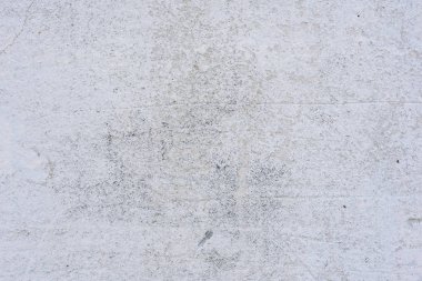 Doku, duvar, beton, arka plan olarak kullanılabilir. Çizik ve çatlaklarla dolu bir duvar parçası.