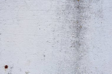 Doku, duvar, beton, arka plan olarak kullanılabilir. Çizik ve çatlaklarla dolu bir duvar parçası.