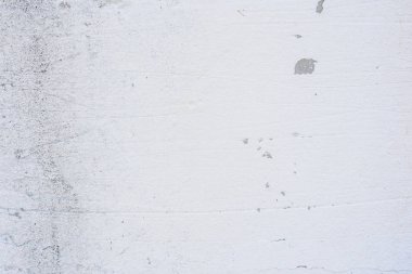 Doku, duvar, beton, arka plan olarak kullanılabilir. Çizik ve çatlaklarla dolu bir duvar parçası.