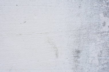 Doku, duvar, beton, arka plan olarak kullanılabilir. Çizik ve çatlaklarla dolu bir duvar parçası.