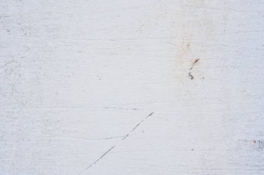 Doku, duvar, beton, arka plan olarak kullanılabilir. Çizik ve çatlaklarla dolu bir duvar parçası.