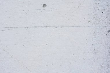 Doku, duvar, beton, arka plan olarak kullanılabilir. Çizik ve çatlaklarla dolu bir duvar parçası.