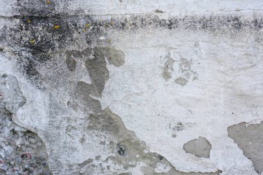 Doku, duvar, beton, arka plan olarak kullanılabilir. Çizik ve çatlaklarla dolu bir duvar parçası.