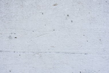 Doku, duvar, beton, arka plan olarak kullanılabilir. Çizik ve çatlaklarla dolu bir duvar parçası.