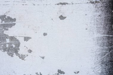 Doku, duvar, beton, arka plan olarak kullanılabilir. Çizik ve çatlaklarla dolu bir duvar parçası.