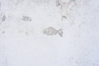 Doku, duvar, beton, arka plan olarak kullanılabilir. Çizik ve çatlaklarla dolu bir duvar parçası.