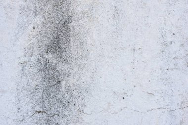 Doku, duvar, beton, arka plan olarak kullanılabilir. Çizik ve çatlaklarla dolu bir duvar parçası.