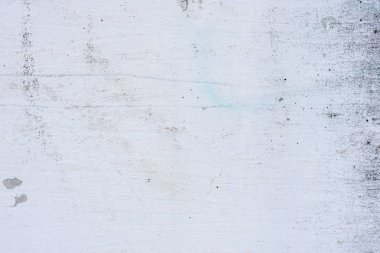 Doku, duvar, beton, arka plan olarak kullanılabilir. Çizik ve çatlaklarla dolu bir duvar parçası.